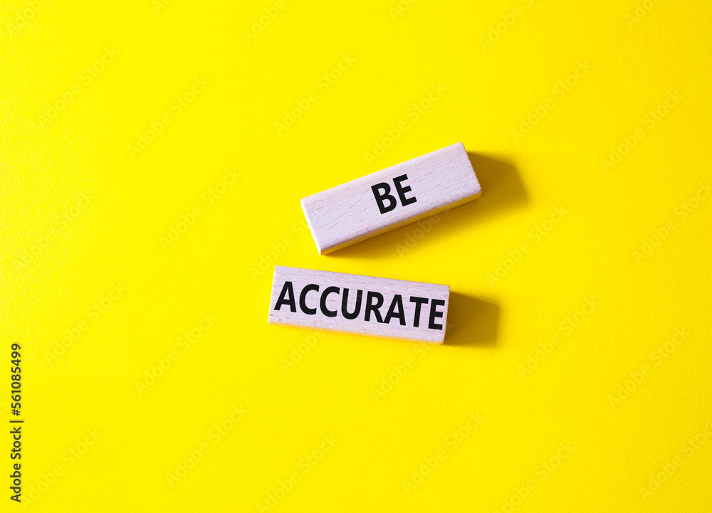 Be accurate symbol. Wooden blocks with words Be accurate. Businessman hand. Beautiful yellow background. Business and Be accurate concept. Copy space. Be accurate symbol. Wooden blocks with words Be accurate. Businessman hand. Beautiful yellow background. Business and Be accurate concept. Copy space.