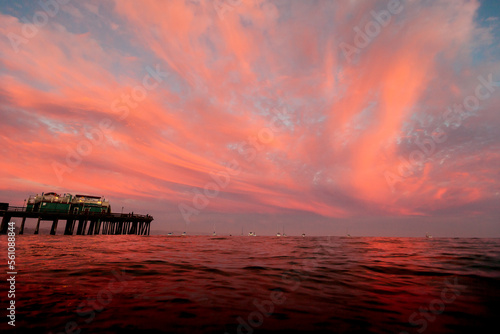 Capitola California Wharf at sunset with pink clouds photo