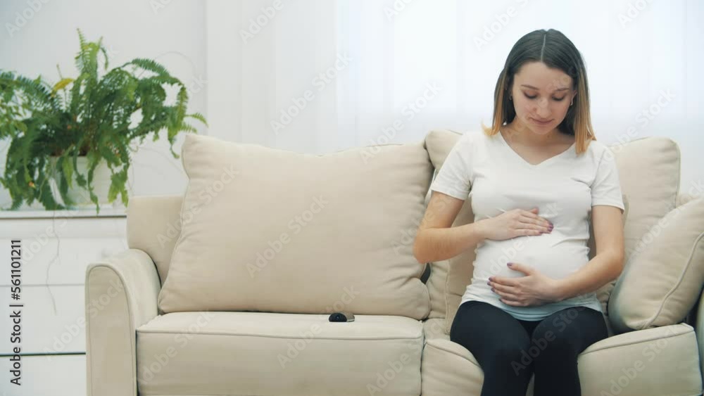 4k slowmotion video of pregnant woman touching her stomach. 4k slowmotion video of pregnant woman touching her stomach.