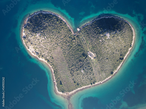 Aerial drone view of Galesnjak the Island of Love in Croatia with beautiful blue turquoise sea water. Heart shaped Island. Travel and holidays destination. Amazing tourism in Croatia Islands.