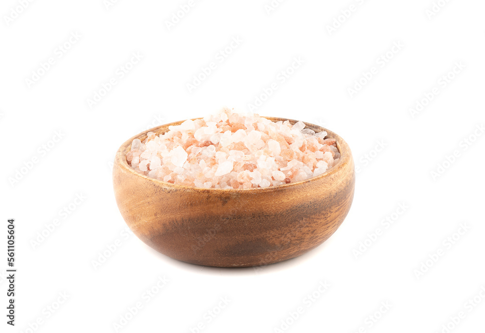Wooden bowl with large pink Himalayan salt on a white background. Wooden bowl with large pink Himalayan salt on a white background.