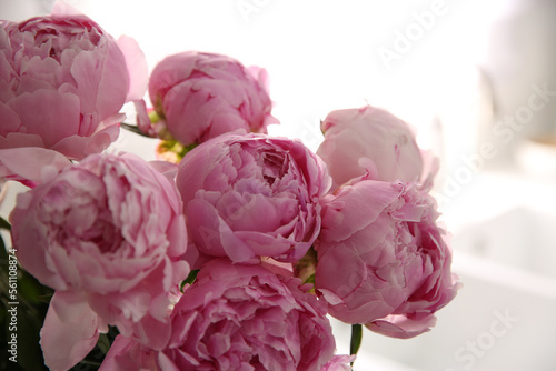 Bouquet of beautiful fresh pink peonies indoors, closeup