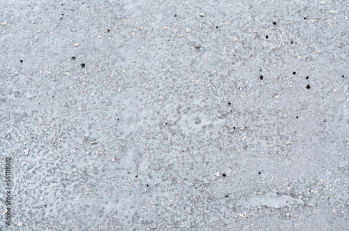 Natural gray grunge cement wall texture. Can be used as an abstract background with copy space.