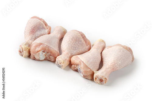 Fresh uncooked raw chicken legs drumsticks isolated on a white background with clipping path, cut out. .