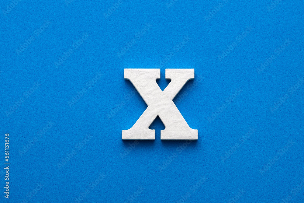 Obraz premium Letter X uppercase - White wood font on blue foamy background