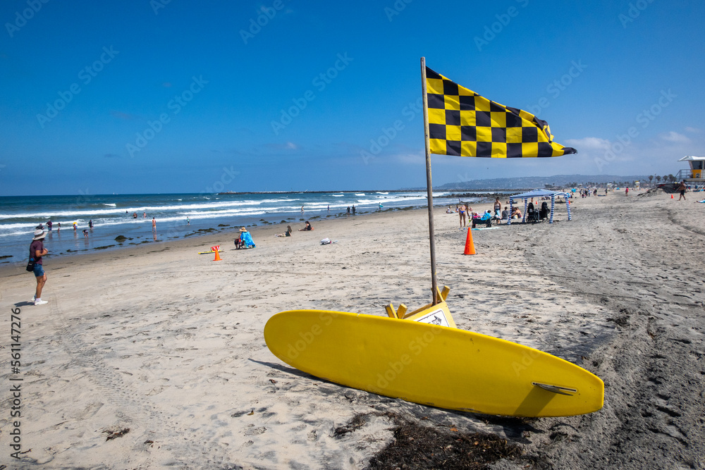San Diego, California, May 13, 2022: A Surf Waring Flad to Warn Surfers to ba Carefull San Diego, California, May 13, 2022: A Surf Waring Flad to Warn Surfers to ba Carefull