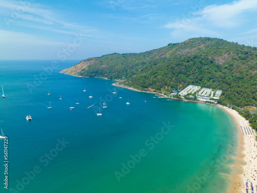 Aerial View Amazing beach with travel people relaxation on the beach,Beautiful sea in summer season at Phuket island Thailand,Travel people on beach,Beach during summer with many resting people © panya99