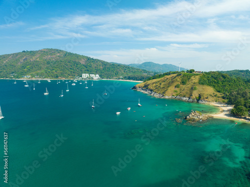 Fototapeta Naklejka Na Ścianę i Meble -  Aerial View Amazing sea with travel boats,sailing boats in the sea,Beautiful sea in summer season at Phuket island Thailand, Travel boats,Ocean during summer with many resting people