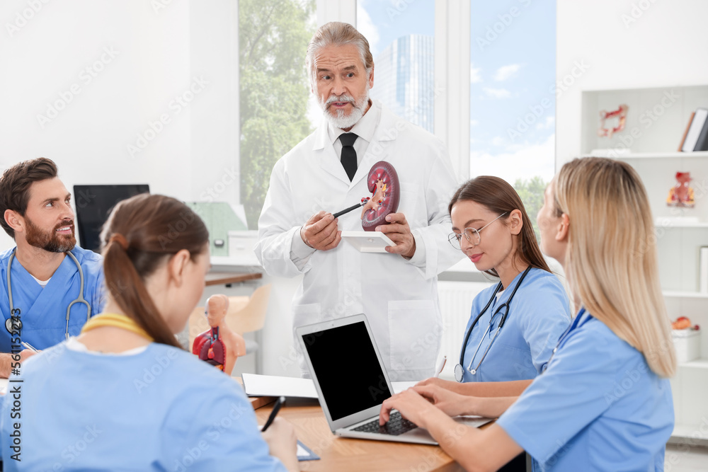Doctor giving lecture for interns in university Doctor giving lecture for interns in university