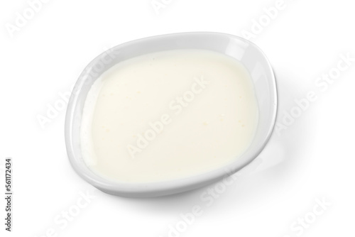 sour cream in bowl, isolated on white