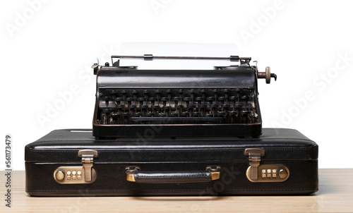 Antique old vintage retro typewriter on suitcase