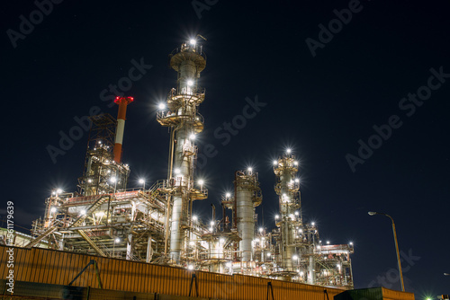 三重県・四日市市の工場夜景　石油化学コンビナート　Night view of petrochemical industrial plant in Yokkaichi, Japan photo