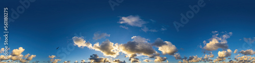 Dark blue sunset sky panorama with Cumulus clouds. Seamless hdr pano in spherical equirectangular format. Complete zenith for 3D visualization, game and sky replacement for aerial drone 360 panoramas.