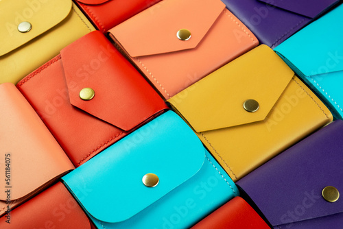 bright colored leather wallets lie close to each other