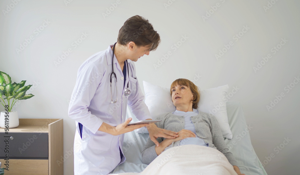 Obraz premium Portrait of caucasian doctor check up body of sick patient on bed in hospital in medical and healthcare treatment at nursing home or clinic. People lifestyle