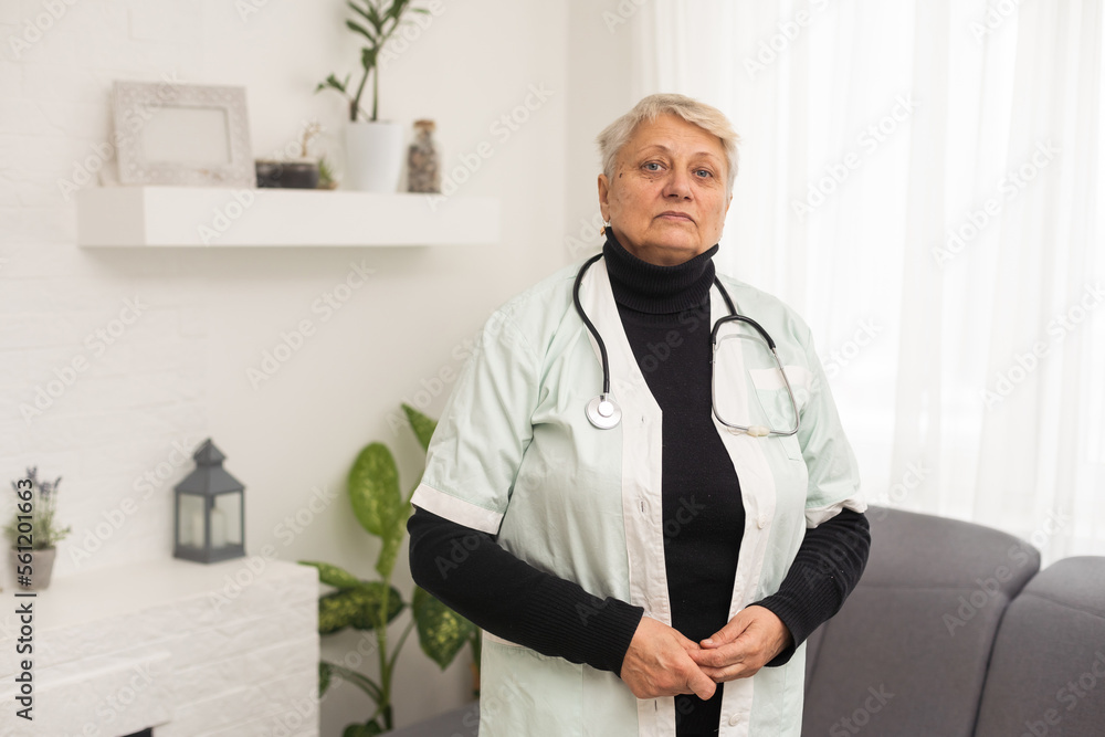 an elderly woman doctor, nurse