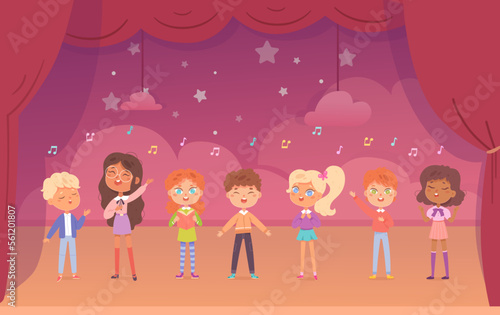 Children sing to music on theater stage with red curtains, girls and boys singing song