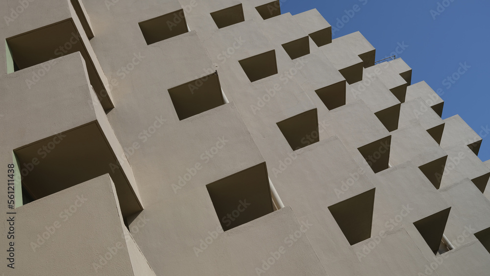Building profile with concrete beams against sky Building profile with concrete beams against sky