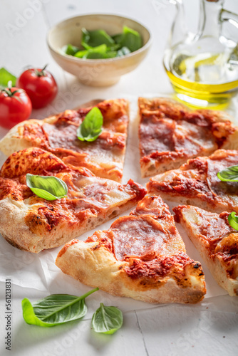Homemade and tasty pizza served with lemonade. Traditional Italian pizza.