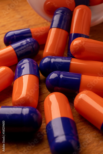 A picture of blue and orange pills, symbolizing the power of nature in providing healing and treatment