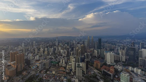 Wallpaper Mural Aerial day-time time lapse overlooking a wide view of a city skyline with dancing rays before sunset in Kuala Lumpur, Malaysia. Prores 4K DCI Torontodigital.ca