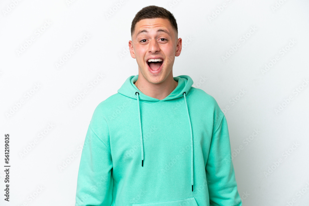 Young brazilian man isolated on white background with surprise facial expression Young brazilian man isolated on white background with surprise facial expression