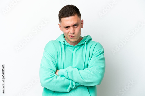 Young brazilian man isolated on white background with unhappy expression