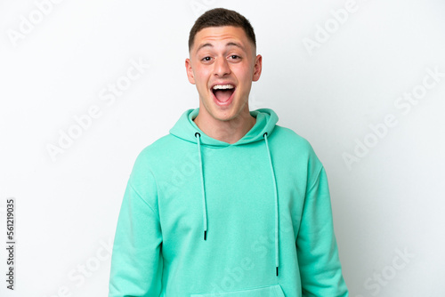 Young brazilian man isolated on white background with surprise facial expression © luismolinero
