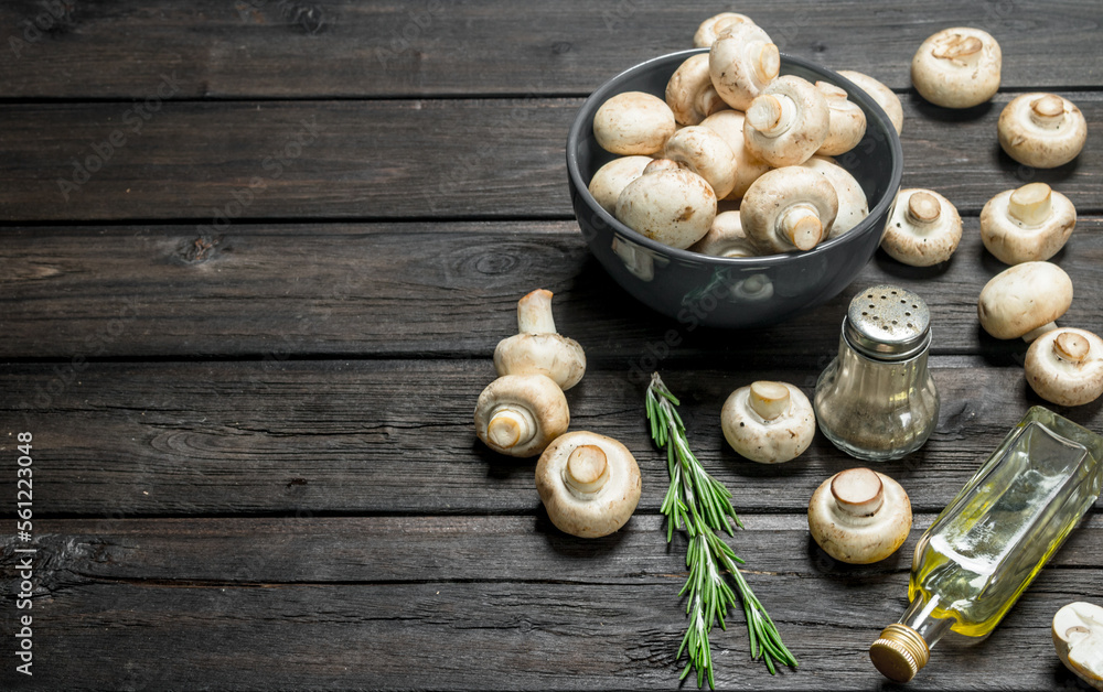 Fresh mushrooms in bowl with seasonings. Fresh mushrooms in bowl with seasonings.
