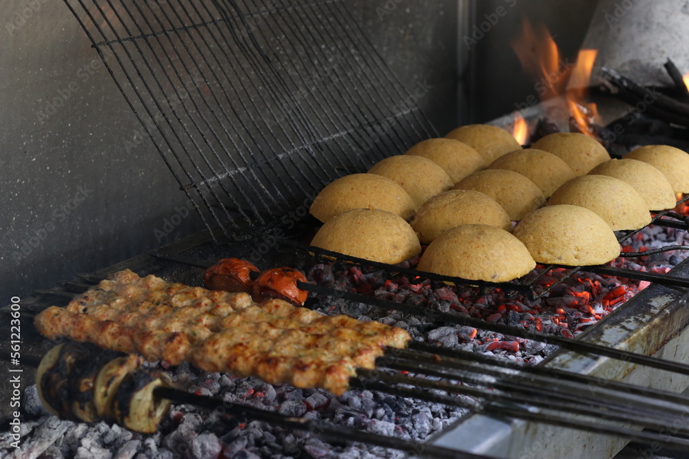 Grilling Kubba and Kebab on Fire  Mashawi and BBQ Grills in The Middle Eastern Cuisine
