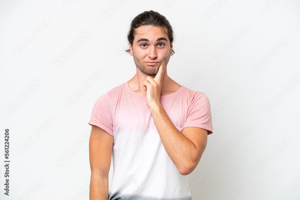 Caucasian handsome man isolated on white background and thinking Caucasian handsome man isolated on white background and thinking