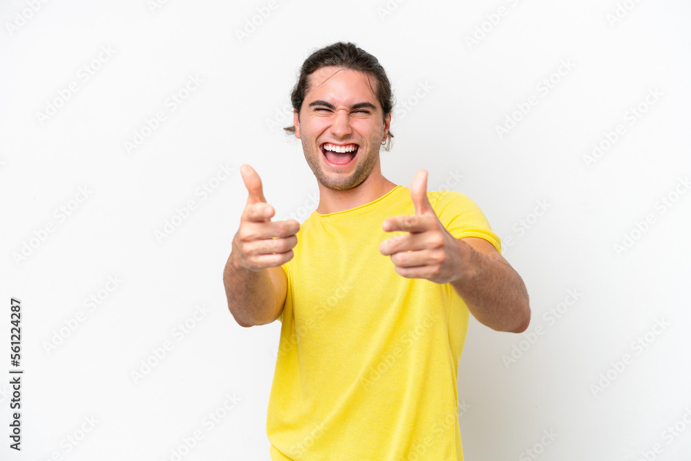 Caucasian handsome man isolated on white background pointing to the front and smiling Caucasian handsome man isolated on white background pointing to the front and smiling
