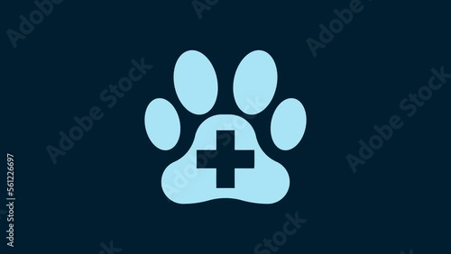 White Veterinary clinic symbol icon isolated on blue background. Cross hospital sign. A stylized paw print dog or cat. Pet First Aid sign. 4K Video motion graphic animation