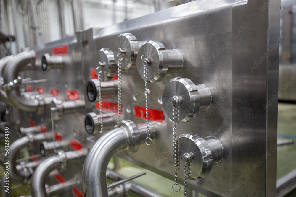 Fototapeta premium Pipe Modern coconut milk cellar with stainless steel tanks