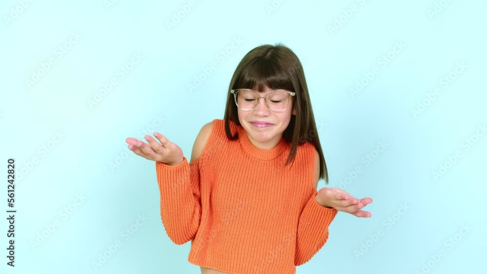 Little girl with glasses and having doubts