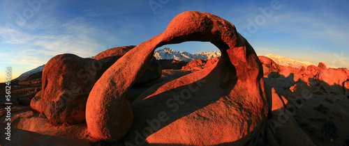 The infamous Whitney Arch located in the Alabama Hills of Lone Pine, California, USA creates a window with a view of Mount Whitney, the highest peak in the contiguous United States photo