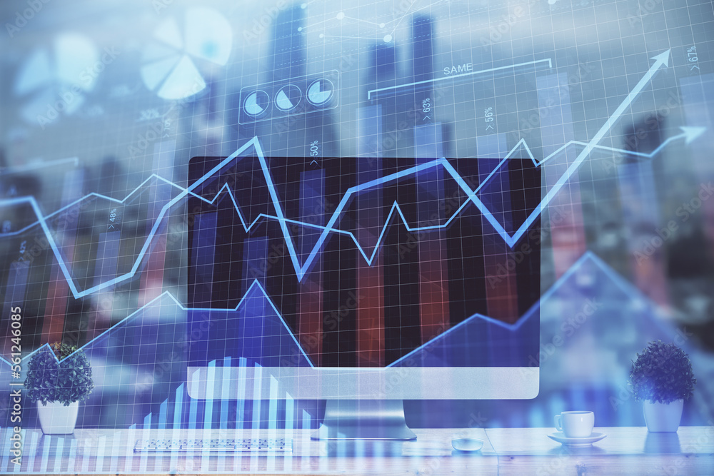 Forex market graph hologram and personal computer on background. Multi exposure. Concept of investment. Forex market graph hologram and personal computer on background. Multi exposure. Concept of investment.