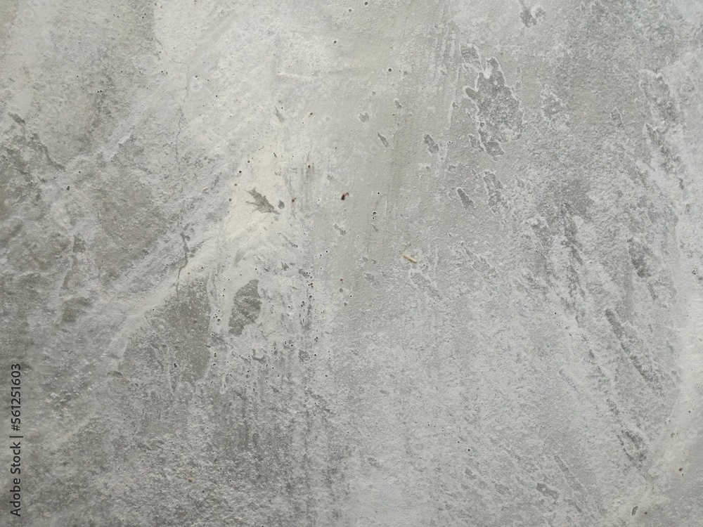 grey cement wall background with dark pattern. grey cement wall background with dark pattern.