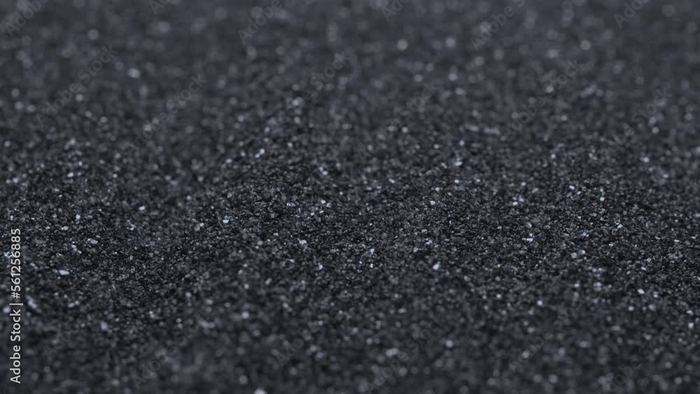 Black sand grunge background. Сlose-up. Black sand grunge background. Сlose-up.