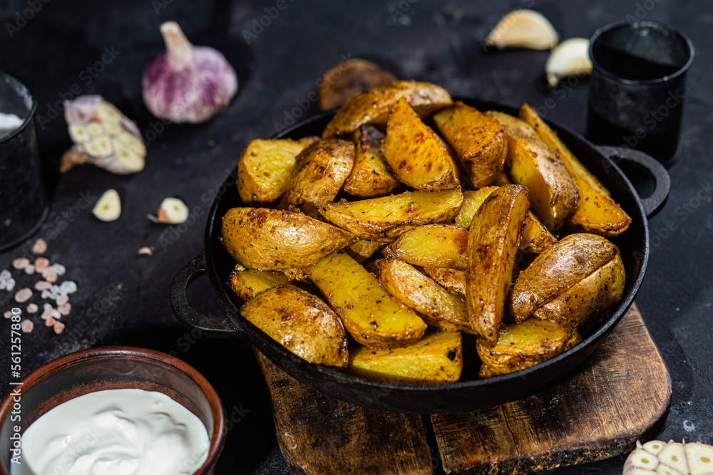 fried potatoes Rustic potato with garlic and spices fried potatoes Rustic potato with garlic and spices