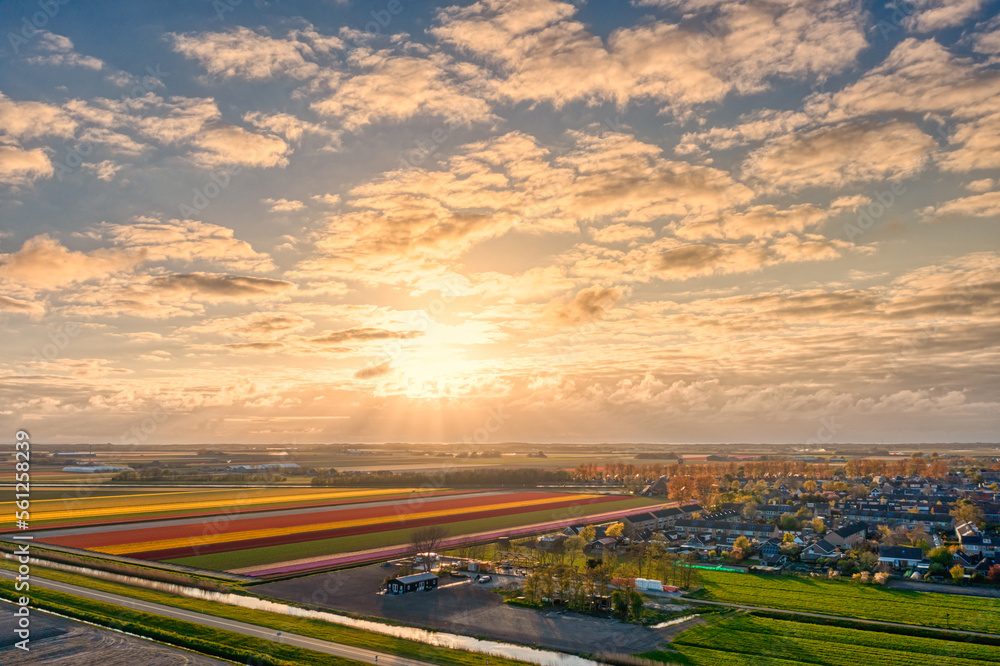 Cloudscape and sunset above the village of 't Zand in The Netherlands. Cloudscape and sunset above the village of 't Zand in The Netherlands.