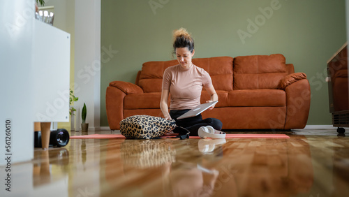 Photos Young Working Woman Balancing Work and Yoga at Home