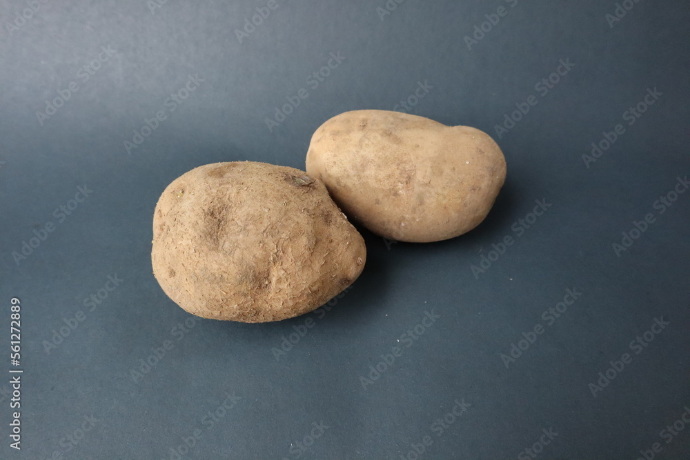 potato isolated on black background close up potato isolated on black background close up