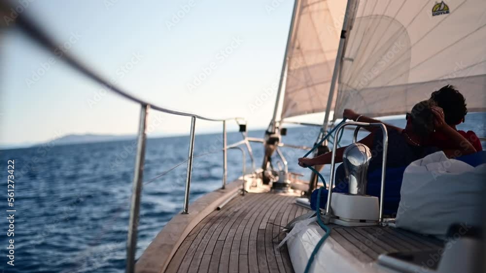 Tropical island in the Great Barrier Reef. coral reef, with yachts sailing. Boats and super yachts on holiday. Voyages travelling on the ocean Tropical island in the Great Barrier Reef. coral reef, with yachts sailing. Boats and super yachts on holiday. Voyages travelling on the ocean