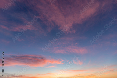 Colorful sunrise sky with pink, orange and yellow clouds
