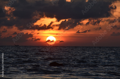 The Sunrise in the cloudy sea