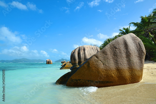 Anse Source d'Argent beach with big granite rocks in sunny day. La Digue Island, Indian Ocean, Seychelles. Tropical destination.