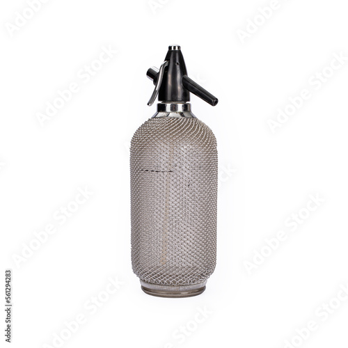 Fotografie Vintage glass soda siphon with metal mesh casing rear view isolated on white