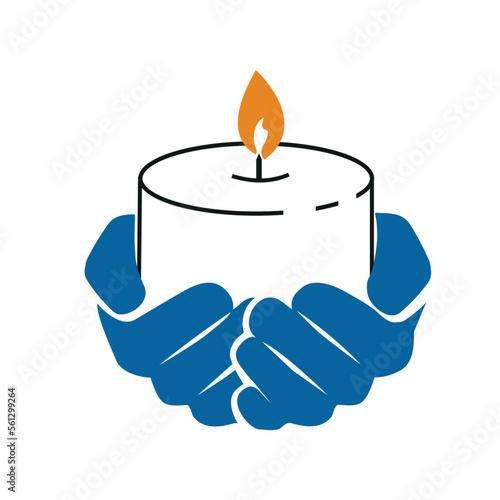Human hands holding a memory candle in the palms. 
