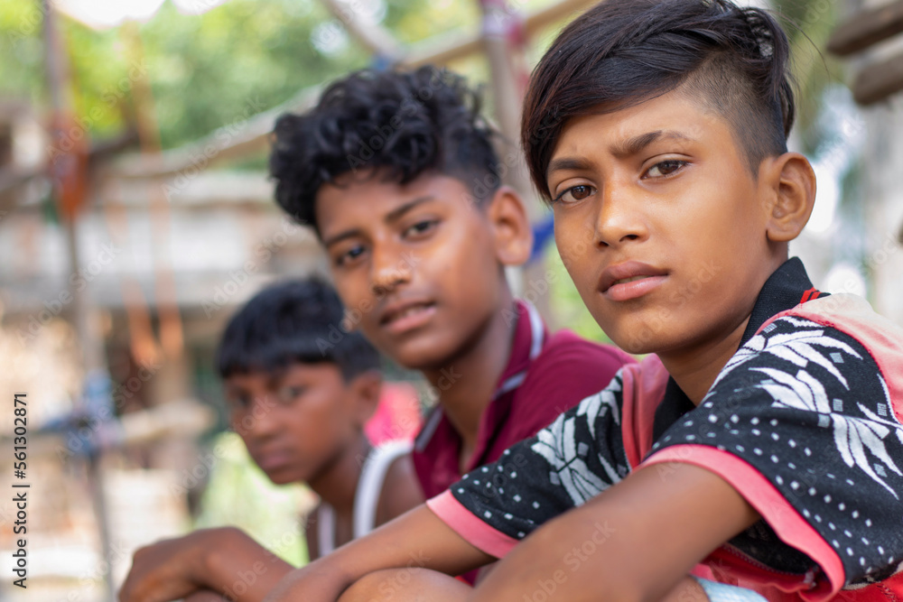 Portrait of Indian boys sitting in the village Portrait of Indian boys sitting in the village